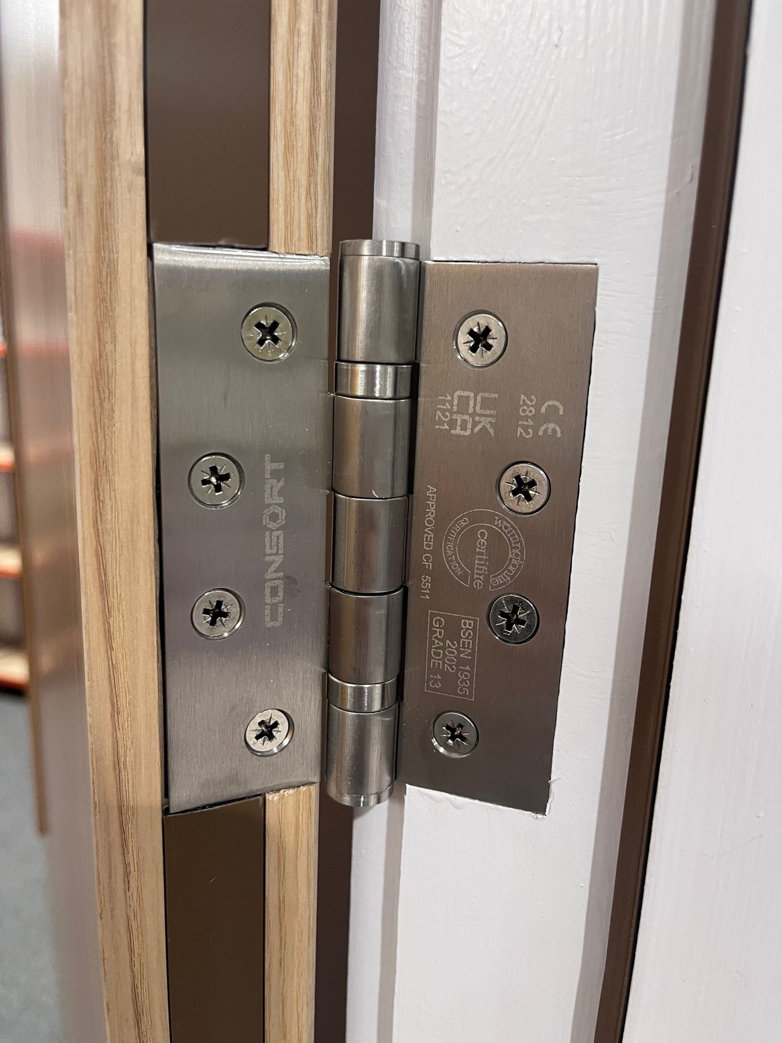 fire door inspection - door hinge checks, and certifications.